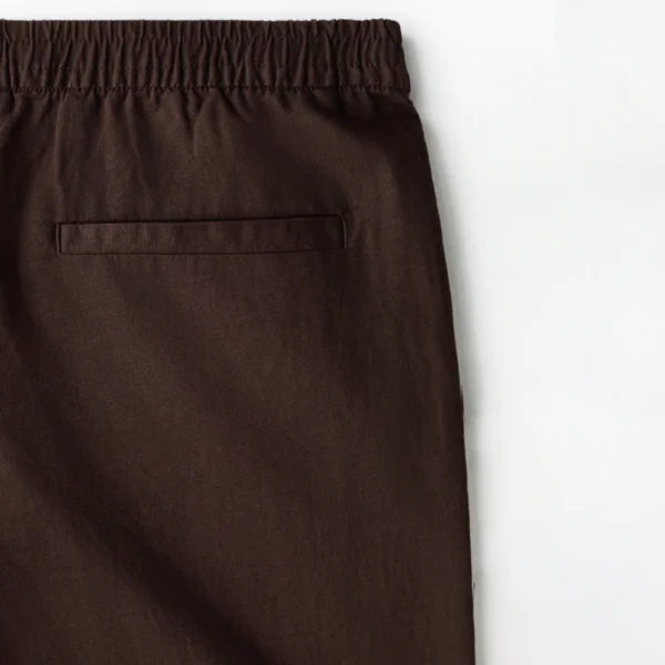 شلوار لینن مردانه نیم بگ خنک و راحت برند H&M - قهوه‌ای - تصویر ۴